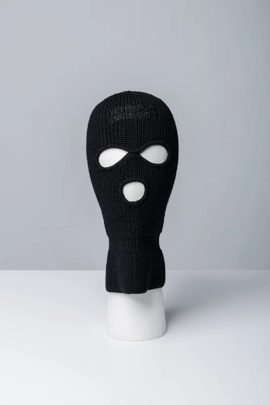 Men's Pants with Ripped and Distressed DetailsVetements Logo Balaclava