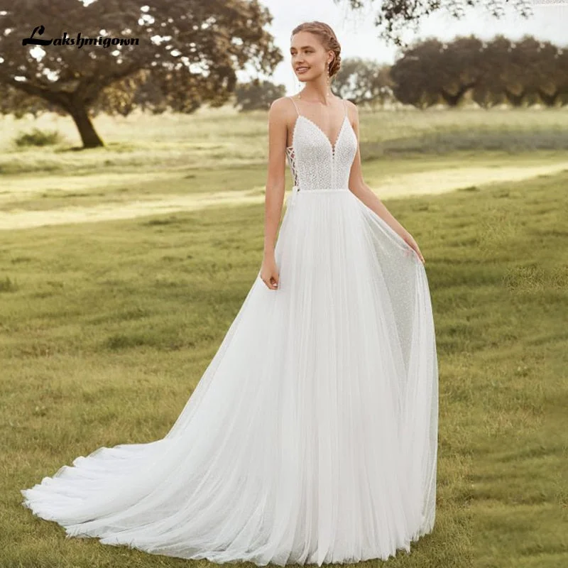 Roycebridal Lakshmigown Spaghetti Straps Boho Wedding Dresses 2021 V Neck Backless Bohemian Lace Bride Dress Tulle Beach Bridal Gown Roycebridal Lakshmigown Spaghetti Straps Boho Wedding Dresses 2021 V Neck Backless Bohemian Lace Bride Dress Tulle Beach Bridal Gown