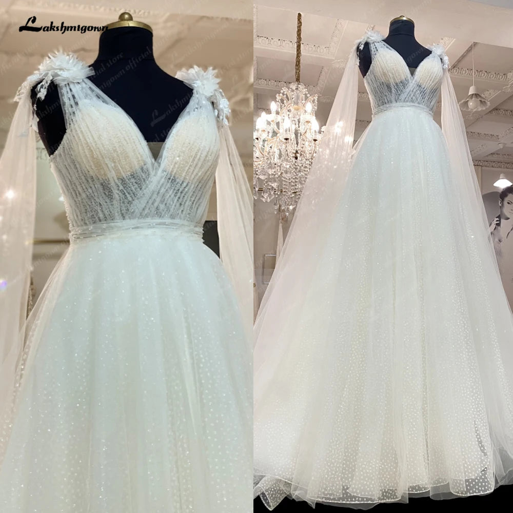 Roycebridal Plunging V Neck Boho Glitter Wedding Dress 2025 with Cape Vestito Donna Sexy Bridal Beach Wedding Gowns Backless Roycebridal Plunging V Neck Boho Glitter Wedding Dress 2025 with Cape Vestito Donna Sexy Bridal Beach Wedding Gowns Backless
