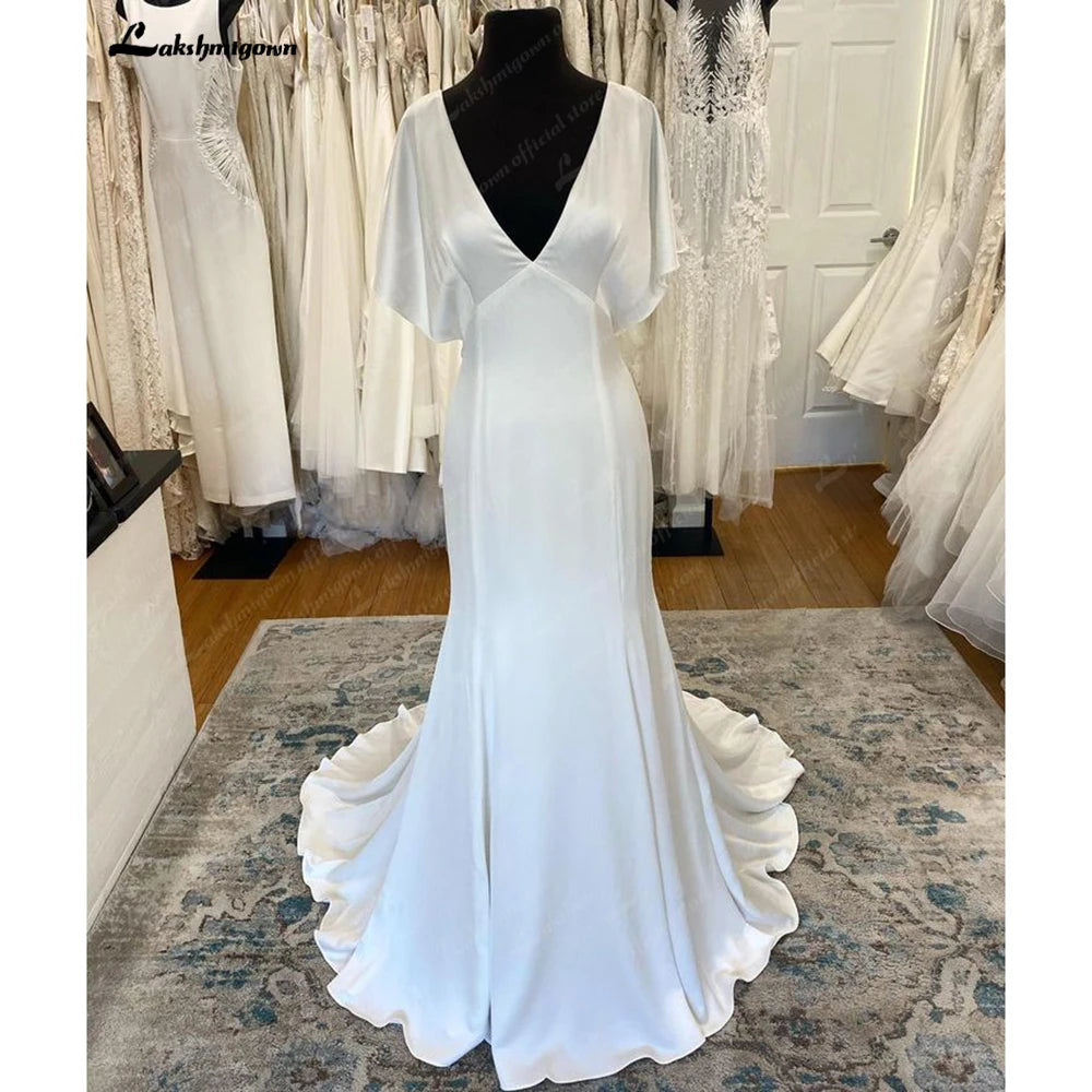 Roycebridal Classic Satin Wedding Dresses 2025 Beach V-Neck Backless Short Sleeves Bridal Gown Robe De Mariée Roycebridal Classic Satin Wedding Dresses 2025 Beach V-Neck Backless Short Sleeves Bridal Gown Robe De Mariée